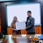 UNM dan UNIKOM Bergandeng Tangan