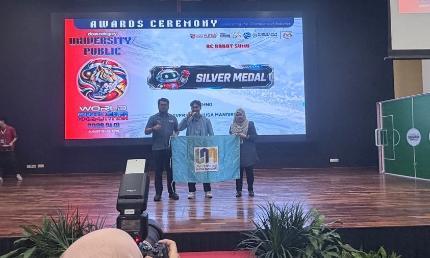 Mahasiswa Bisnis Digital UNM Raih Medali Perak Robotik